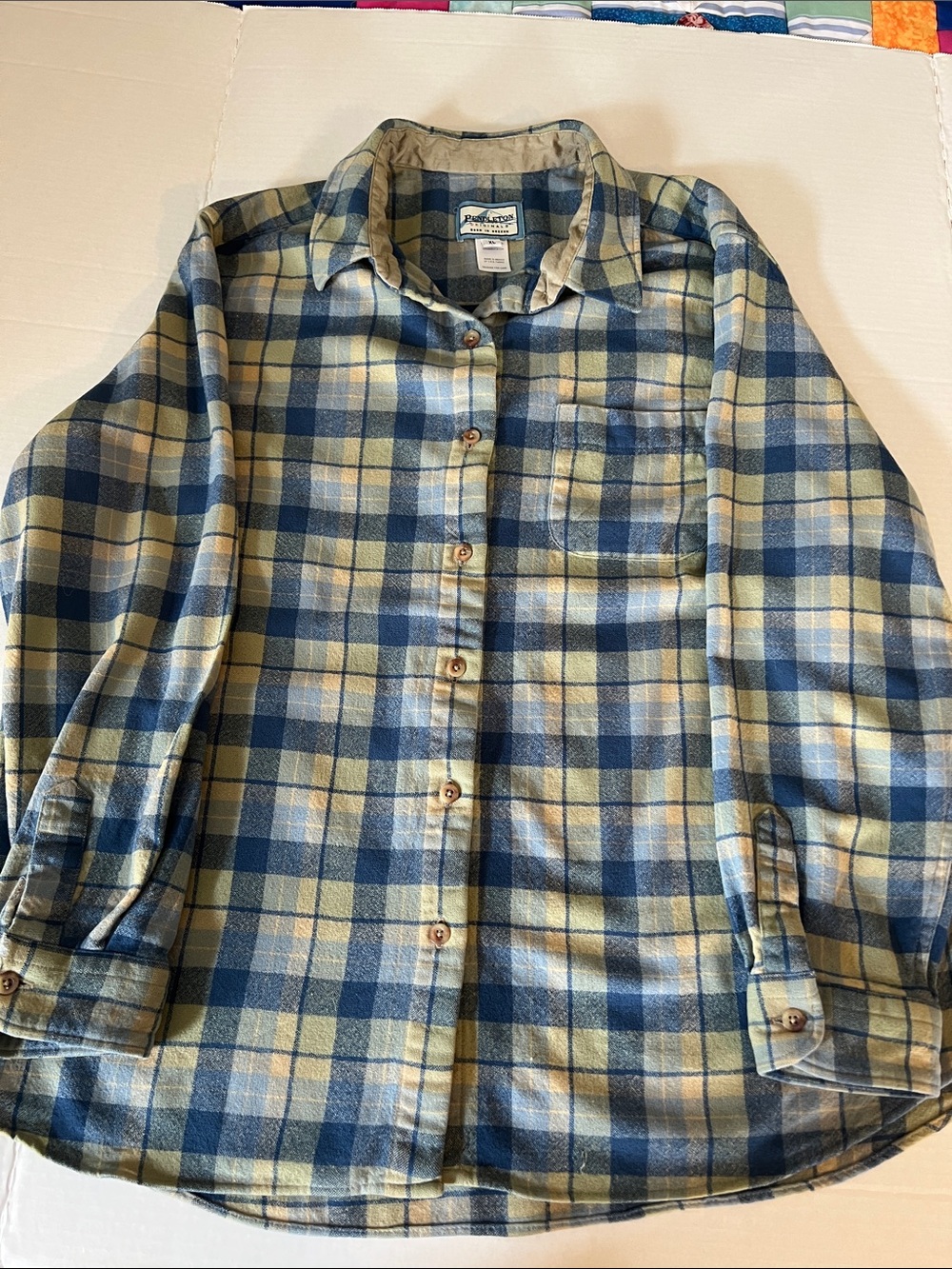 Pendleton Navy Blue, light blue, yellow, and pale green button down wool shirt.